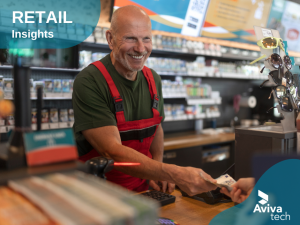 A cashier at a convenience store counter.